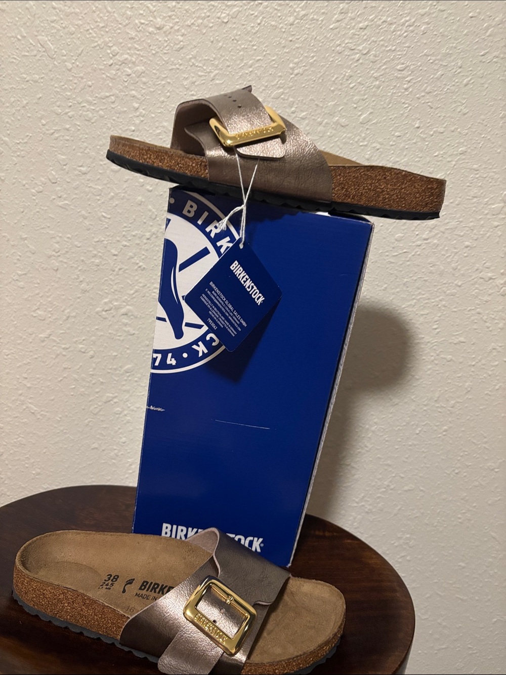 Birkenstock woman Slide Sandal in Metallic Taupe with Gold Buckle